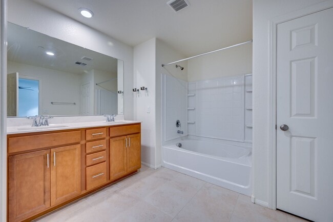 Building Photo - Green Valley!! Gated!! 4 Bedrooms!! Bed & Bath Downstairs!!  TANKLESS WATER HEATER!!! Covered pat...