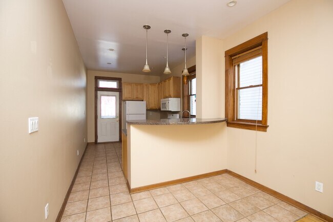 Building Photo - 1002 Beloit Ave