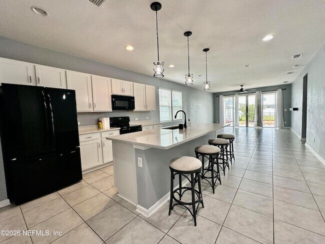 Building Photo - 1443 Tropical Pine Cove