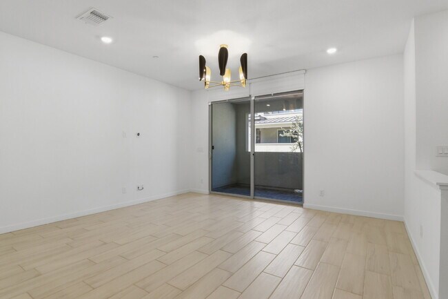 Building Photo - Experience refined living in this beautifully appointed 3-bedroom, 2.5-bathroom townhome spanning...