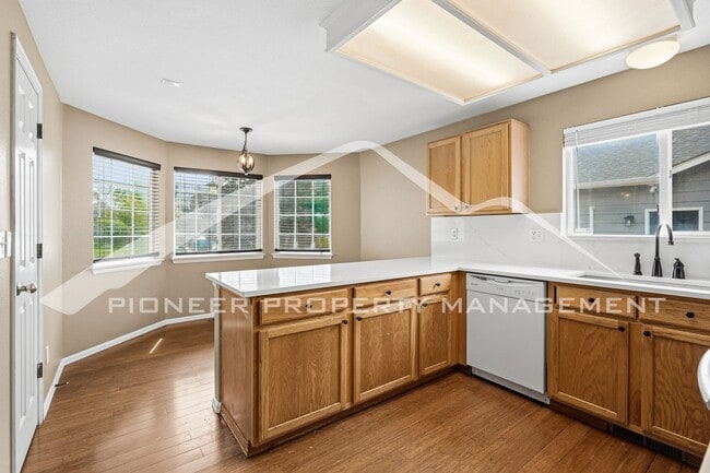 Building Photo - Spacious Home with Central AC and Fenced Yard