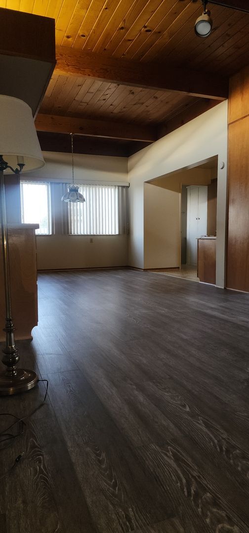 Building Photo - This is a spacious house featuring four bedrooms and two bathrooms, along with a two-car garage.