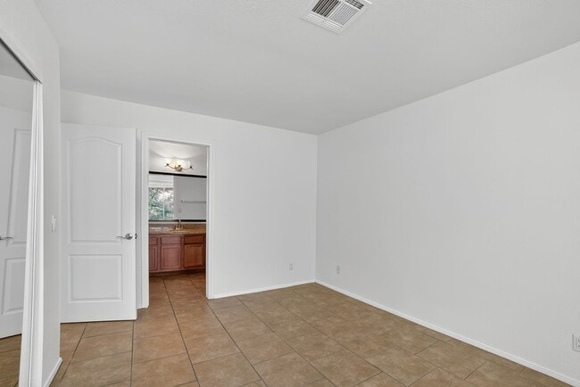 Building Photo - READY TO MOVE-IN UPPER LEVEL 2-BEDROOM CONDO!