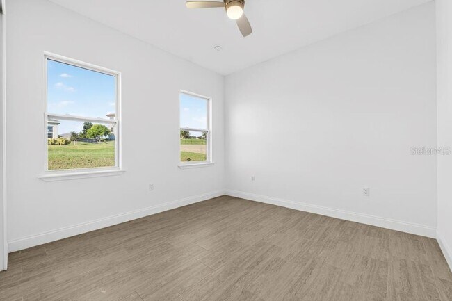 Building Photo - 200 Snowy Orchid Way