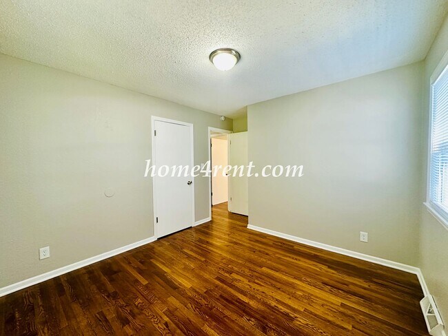 Building Photo - Updated Raytown Ranch w/ Wood Floors, SS Appliances, Finished Basement and a Fenced Yard!