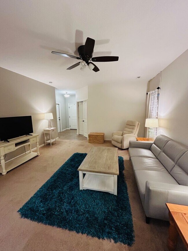 Building Photo - House with Fenced Backyard