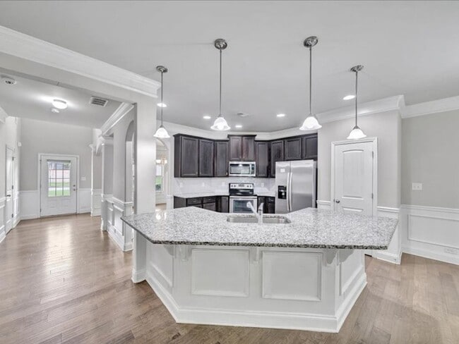 Building Photo - Spacious 4BR Home with Fenced Yard & Community Pool