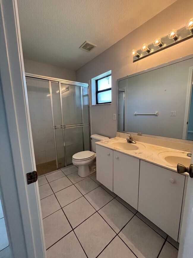 Building Photo - THIS WONT LAST LONG!!!! 3/2 ALL TILE!!!