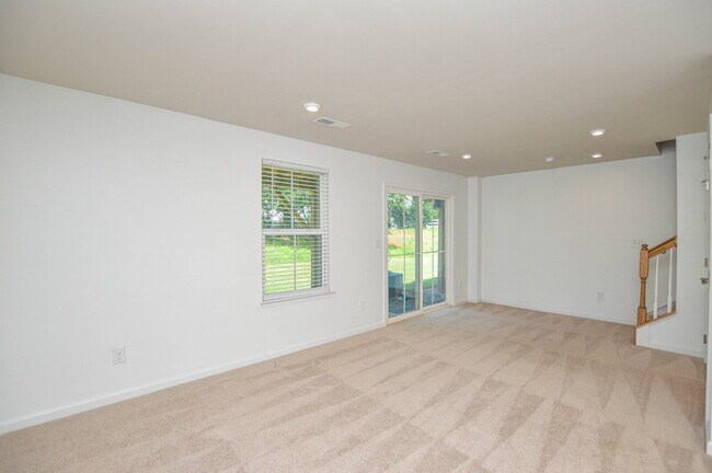 Building Photo - 3 Bedrooms | 2.5 Bathrooms | Lower-Level Flex Room | Approximately 1,978 Square Feet | 2-Car Gara...