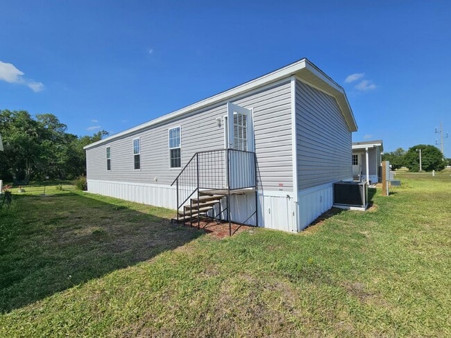 Building Photo - 6591 Hidden Oaks Dr