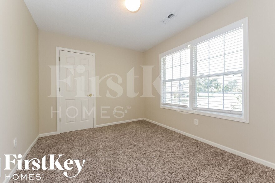 Building Photo - 711 Old Paint Rd