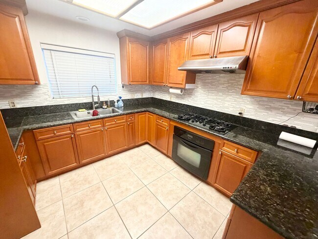 Building Photo - Spacious Modern Home with EV Charger, Solar & Gated 3-Car Garage