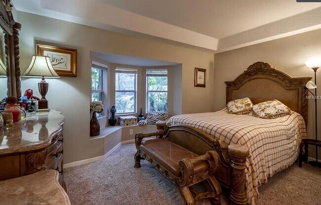 Building Photo - Charming 4-Bedroom Home with Pond Views & ...