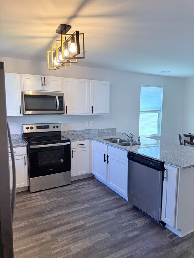 Building Photo - "Charming Coastal Retreat: 3-Bedroom on Island Breeze Lane!" **Limited-time offer: First month FR...