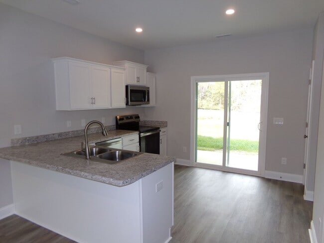 Building Photo - 50% off the first month’s rent! Welcome to Jacks Branch Townhomes