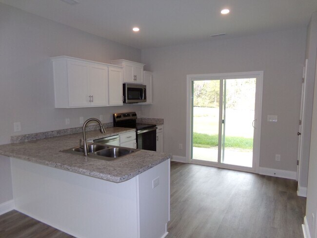 Building Photo - Welcome to Jacks Branch Townhomes – Modern...