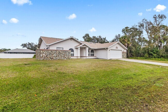 Building Photo - Annual ** 4 Bed / 3 Bath Single Family Home -- $1,950/month