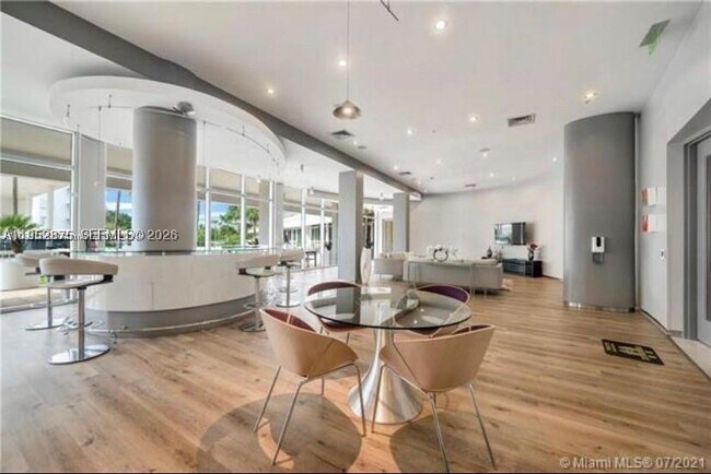 Building Photo - 10275 Collins Ave