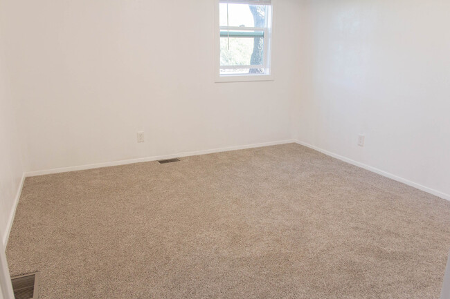 Downstairs bedroom with lovely view of backyard - 100 Beaver St