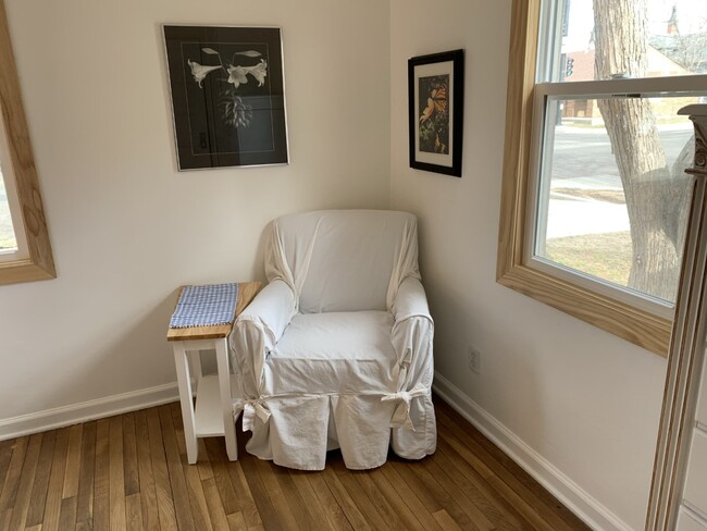 Comfy chair, slip covers provide for easy cleaning. - 322 E 19th St