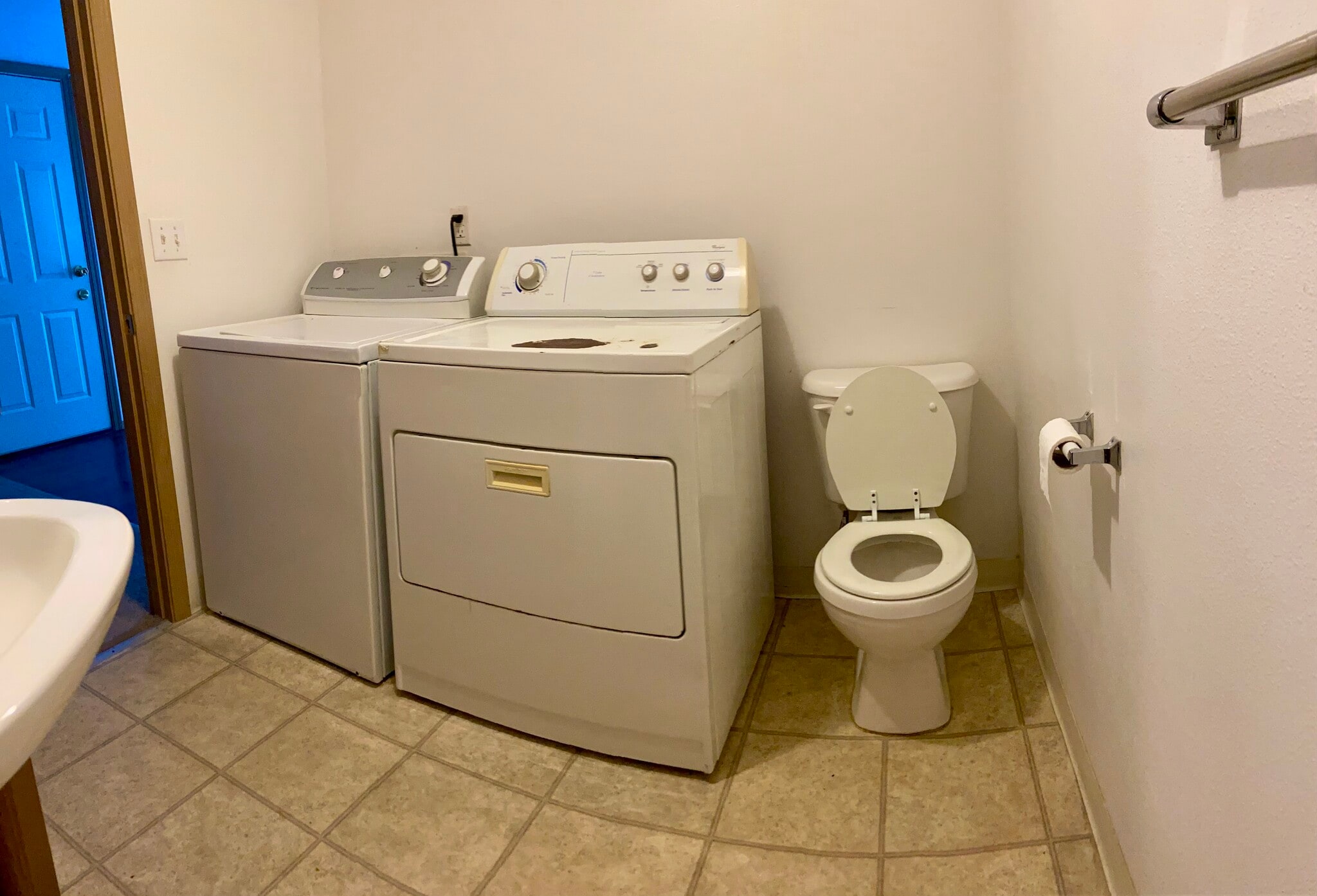Downstairs half bath with washer and dryer - 756 NE 92nd Ave