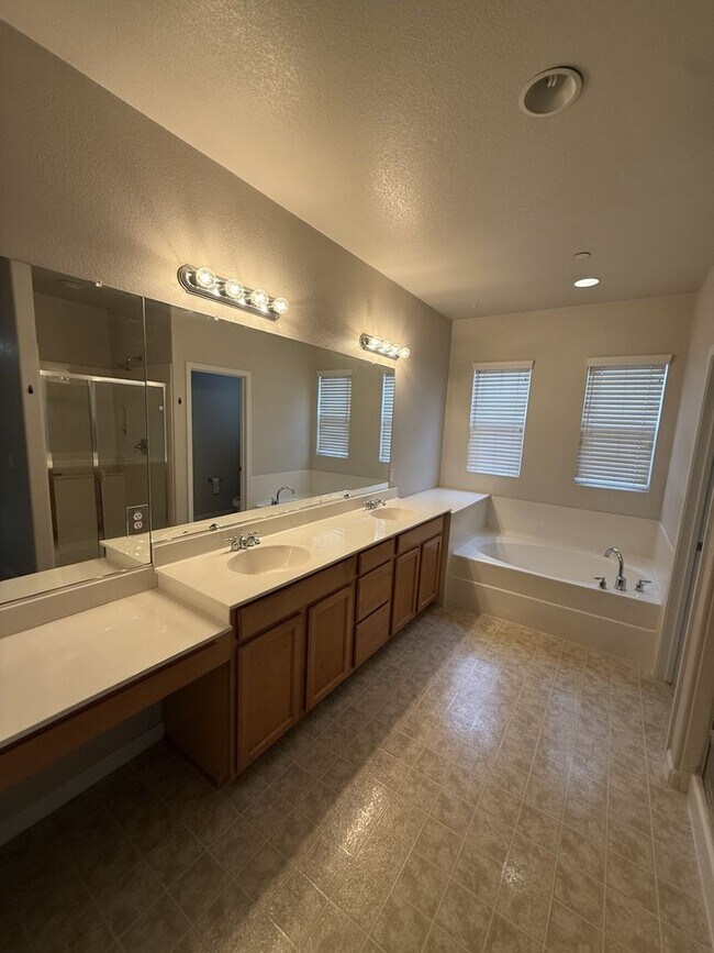 Building Photo - 4BR|2.5BA Townhome w/Garage|Yard| - Tenant Pays $175 monthly for WS&G