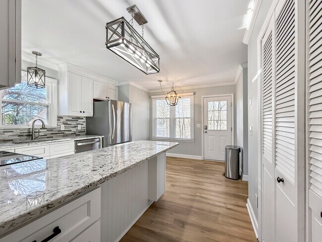 Building Photo - Spacious 3BR 2 BA Home with Wooden Deck in Wake Forest