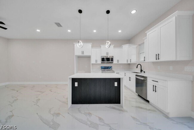 Building Photo - 4648-4650-4650 Leonard Blvd S