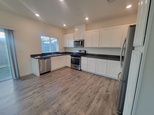 Building Photo - Available now! Stunning New North Natomas Home!