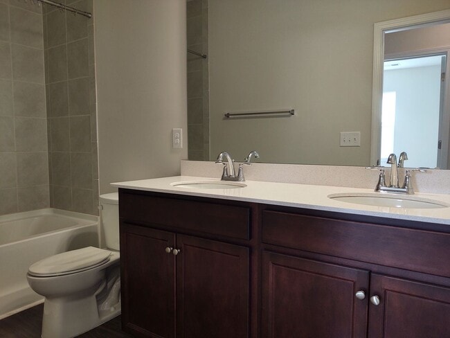 Building Photo - Move-in ready Townhome located in the Perg...