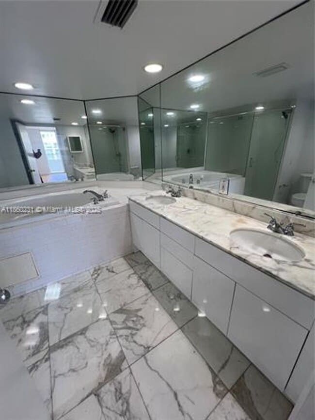 Building Photo - 5600 Collins Ave