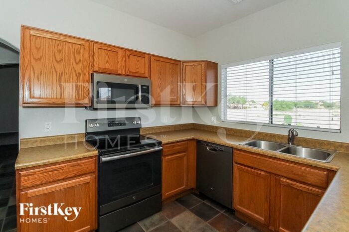 Building Photo - 9747 N Sandy Valley Dr