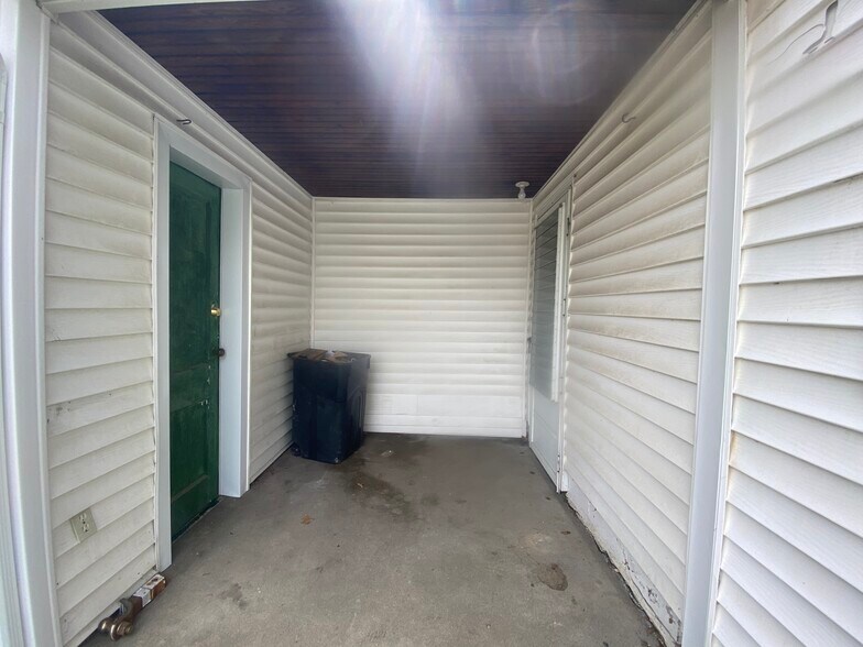 Breeze way to garage - 216 Dort Ln NW