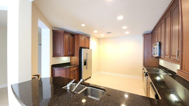 Building Photo - 7508 Toscana Blvd