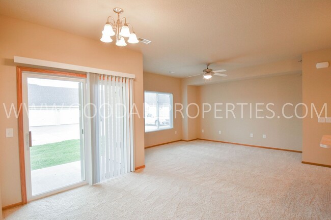 Building Photo - Ground-level condo with 2 bedrooms and 2 b...