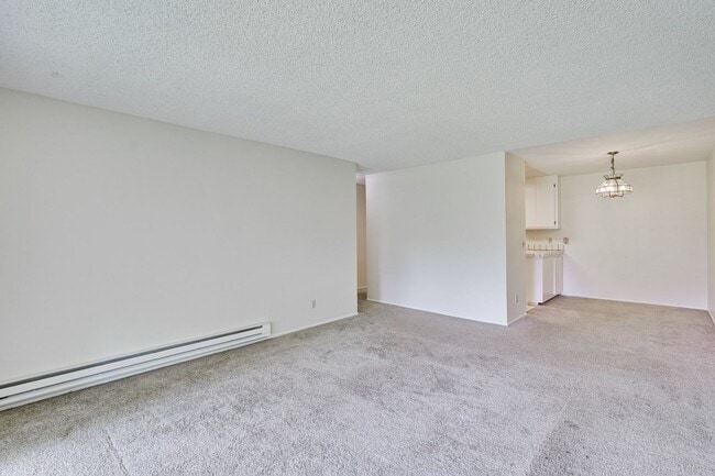 Building Photo - Top Floor Unit - Balcony - Elevator Access - Community Pool & Tennis Court
