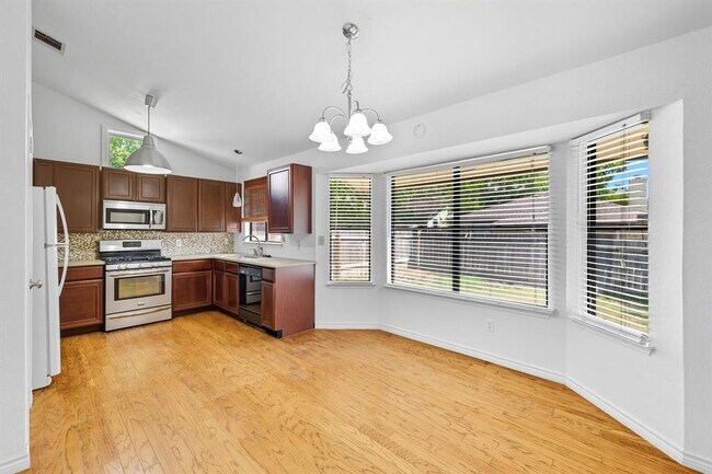 Building Photo - 8909 Romayne Ln