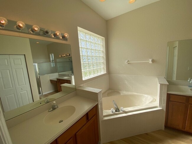 Building Photo - ANNUAL Lease – Unfurnished – Golf Course Lot - Designer Home in the highly sought-after gated com...