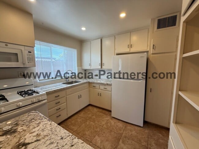 Building Photo - Beautiful Two Bedroom with Storage