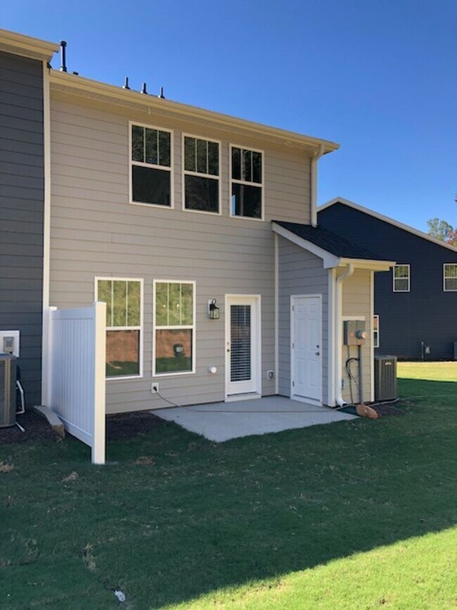 Building Photo - Brand New END UNIT North of Main St  3 miles from Downtown Greenville and I-385.