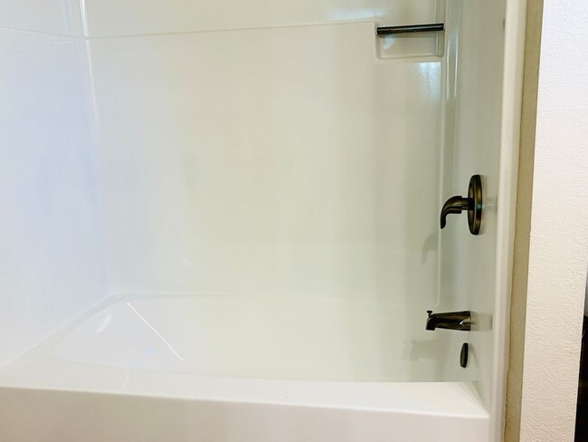 Building Photo - House like 2bed/1.5 Bath Condo with Spacious Corner Yard and 2 Car Garage