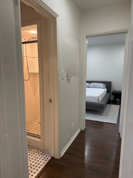 Hallway down to first bedroom and bathroom - 9933 Robbins Dr