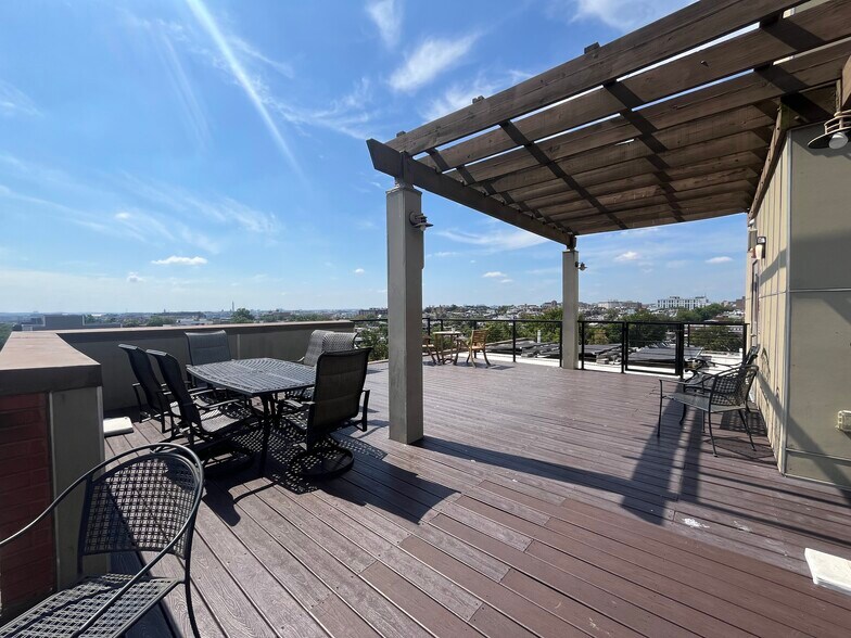 The rooftop deck has a lighted pergola for evening use as well. - 2910 Georgia Ave NW