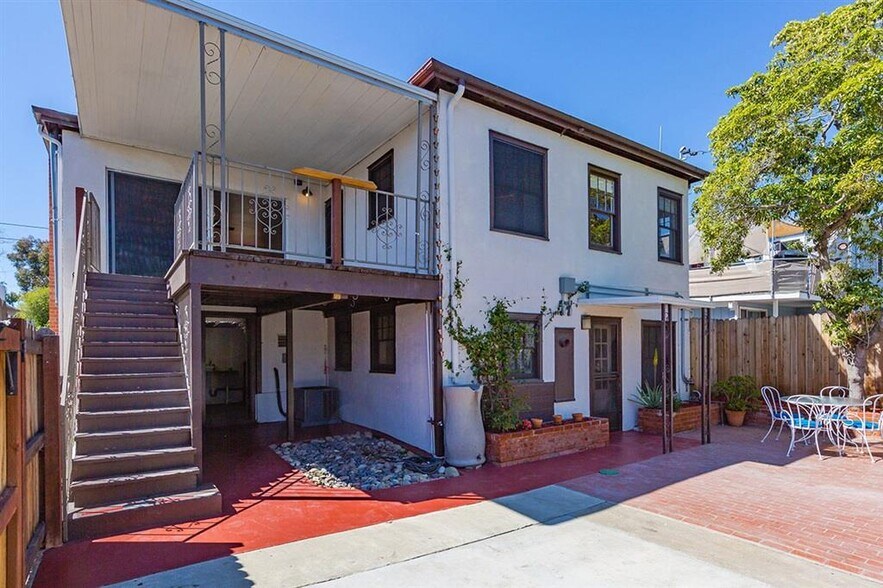 Tucked away downstairs to the left of the upper unit provides privacy and separation. - 1931 33rd St