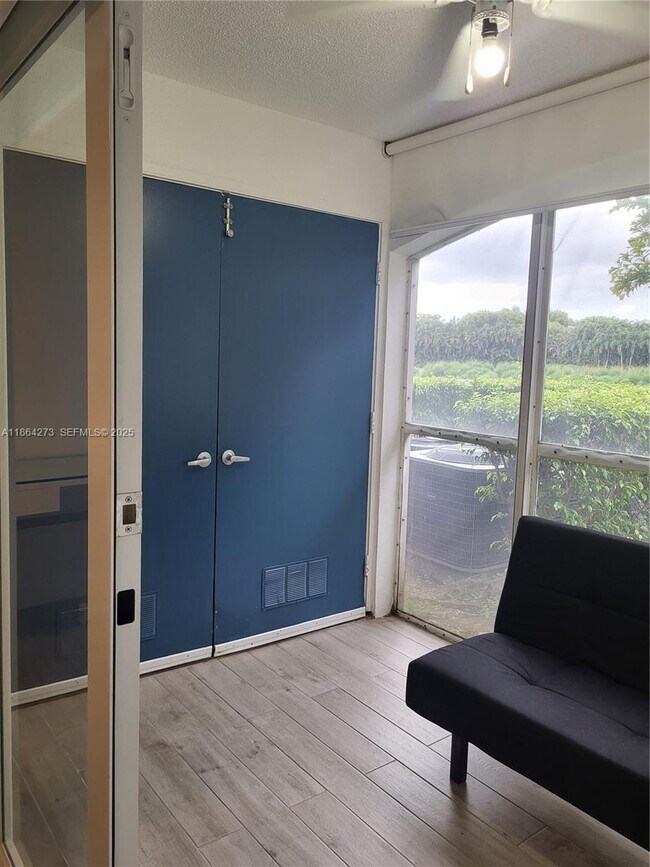 Building Photo - 4555 NW 99th Ave