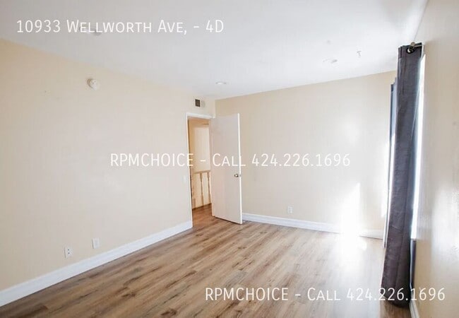 Building Photo - 10933 Wellworth Ave