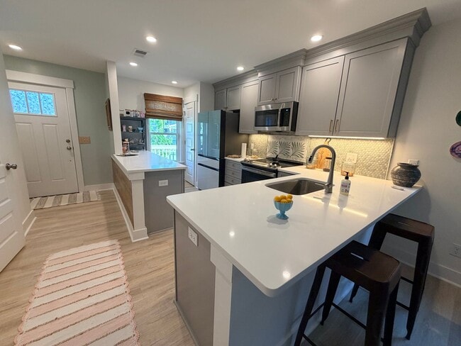 Building Photo - Four Bedroom Town Home in Old Stoney Village- Two Primary Suites