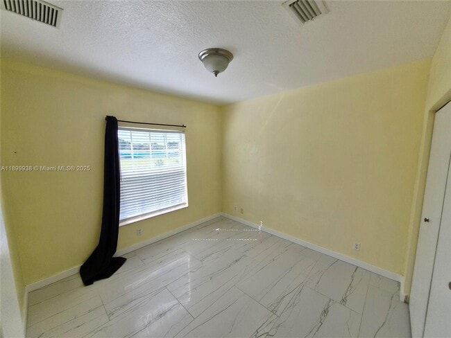 Building Photo - 1209 NW 27th Ave