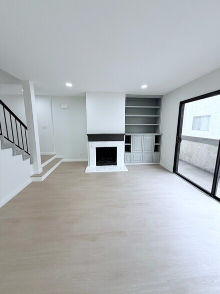 Living Room with Fireplace - 11940 Weddington St