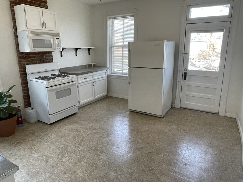 Large eat in kitchen. Previous resident fit a large table with 6 chairs. Gas stove. - 5313 Magnolia Ave